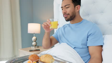 bedroom, breakfast and man eating in a hotel