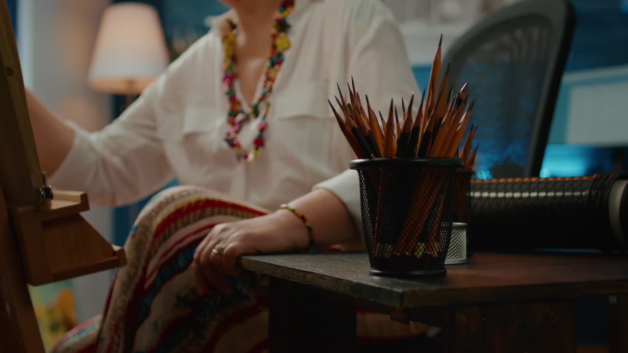 Pencils and artistic drawing tools on table to create artwork