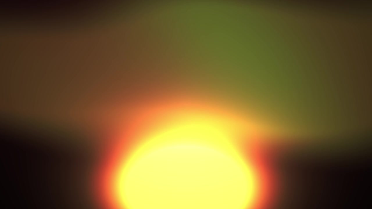 Luce astratta gialla e arancione luminosa che sfarfalla su sfondo scuro