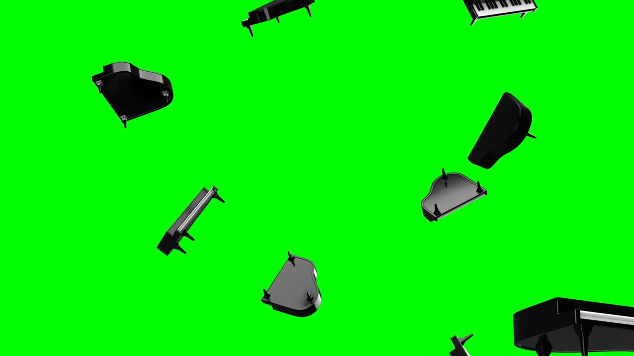 녹색 크로마 키 배경에 비행하는 검은 피아노.
