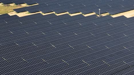 windmill turbine and photovoltaic solar panel farm for renewable energy production ready for agenda 2030 save the planet concept
