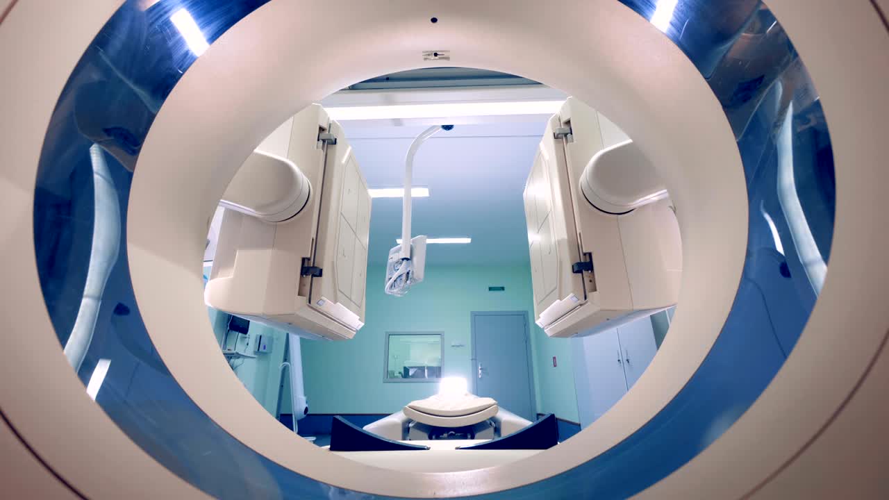 Functioning imaging scanner in it being shot through a target ring