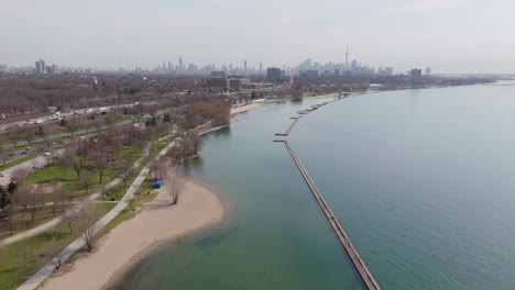 cazsimir gzowski park beach and gardiner expressway in toronto, ontario, canada. aerial drone shot