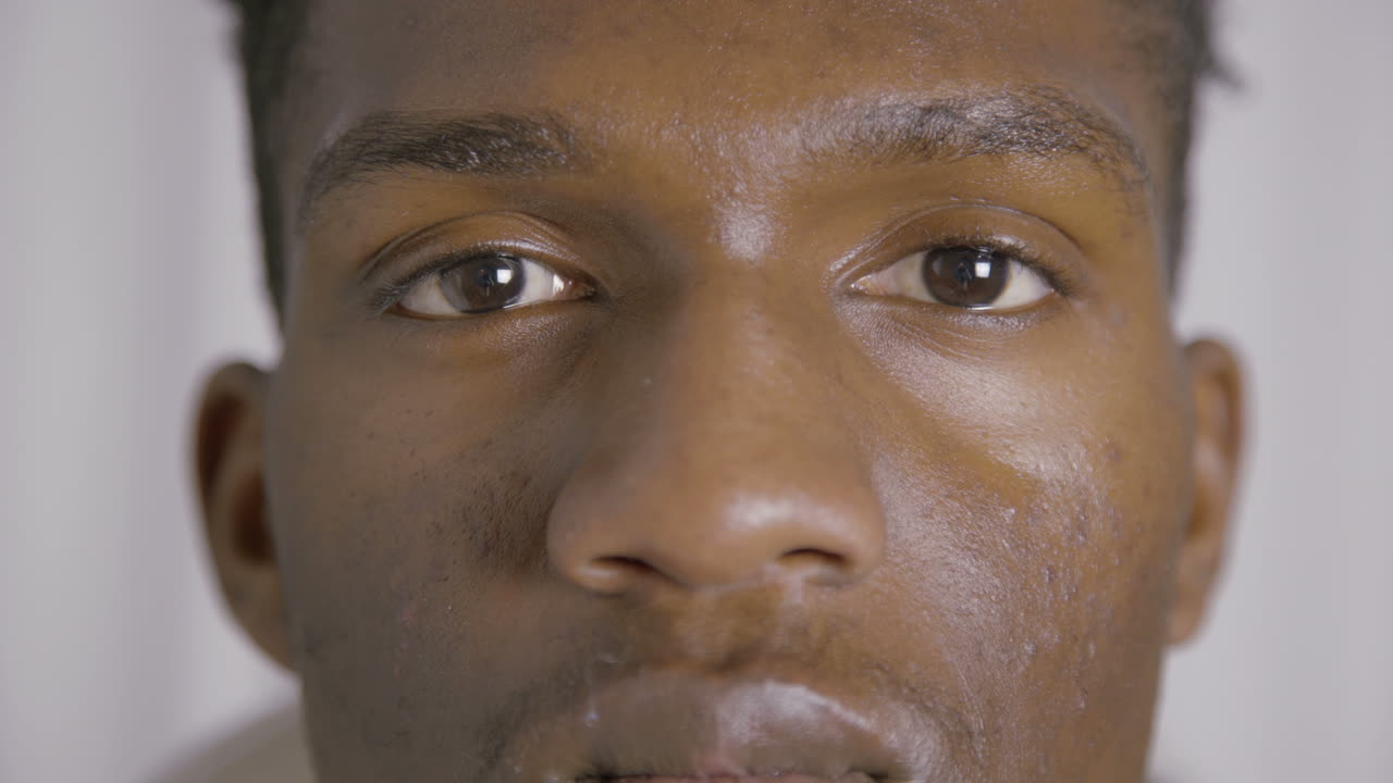 Extreme close-up of young African American man