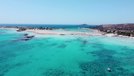 Turquoise-waters-and-sandy-beaches-of-Elafonissi-island-beach,-aerial