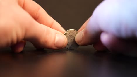 spinning an american nickel coin