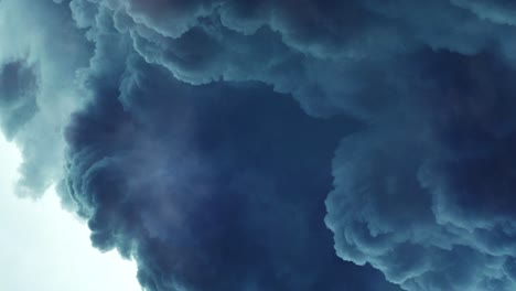 a thunderstorm that was occurring in a dark blue cumulonimbus cloud and was moving