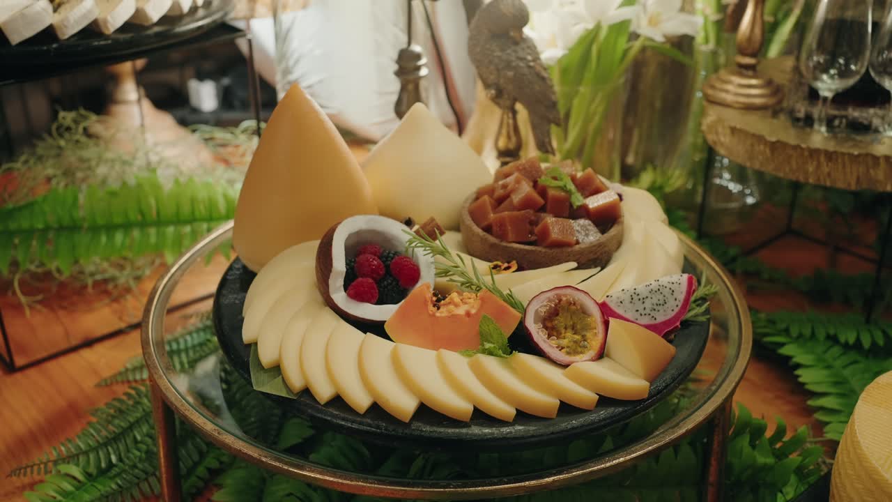 gourmet cheese arrangement with exotic fruits and caramel pieces