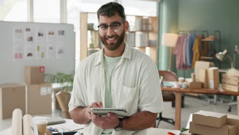 man with tablet surrounded by boxes