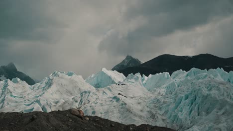 Distant-View-Of-People-Hiking-On-Perito-Moreno-Glacier-In-Los-Glaciares-National-Park,-Argentina