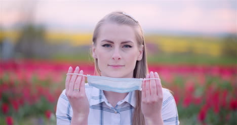 Portrait-Of-Woman-Wearing-Face-Mask-On-Field