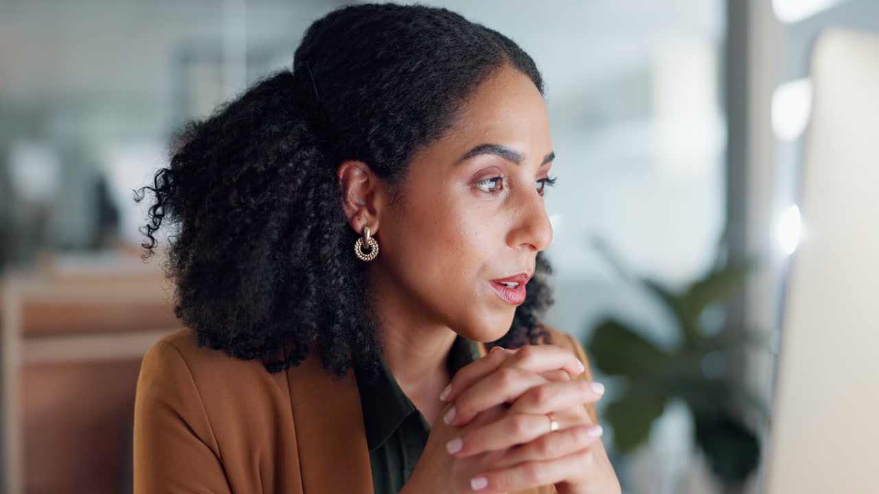 Woman at computer in office
