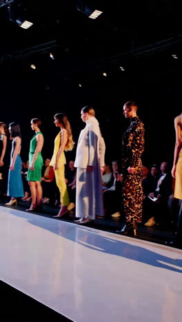 fashion show models walking the runway