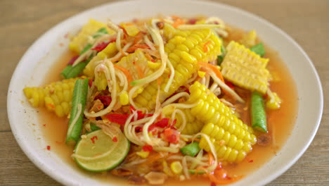 Som-Tum---Thai-spicy-papaya-salad-with-corn---Asian-food-style