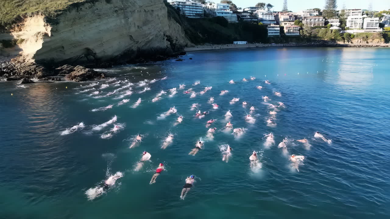 Large Group of Swimmers Participating in an Open Water Competition