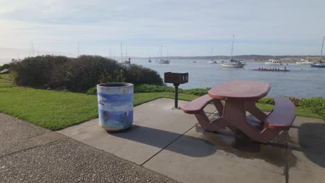 gimbal wide panning shot of a picnic area with barbeques at tidelands park in morro bay, california. 4k
