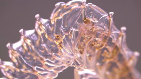 abstract translucent organic structure with golden veins
