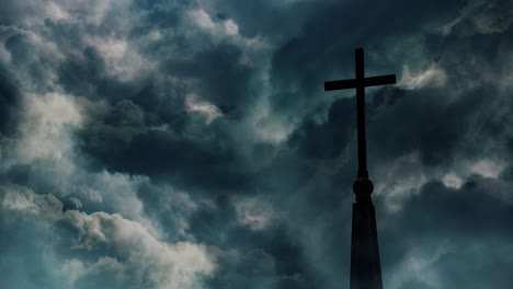 silhouette cross against the background of dark clouds and thunderstorm