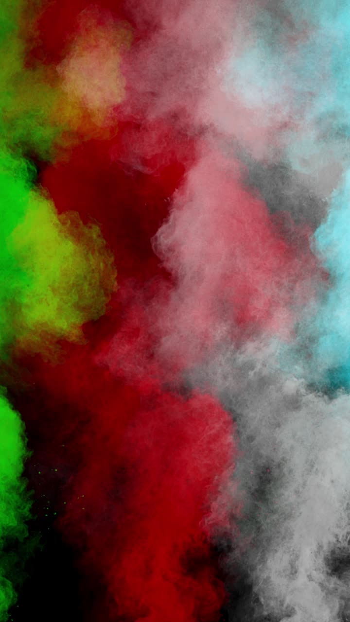 Super Slow Motion Shot of Multi Color Powder Explosion at 1000Fps Vertical View