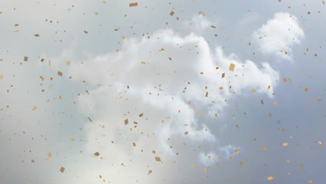 golden confetti falling over cloudy sky background, creating celebratory atmosphere