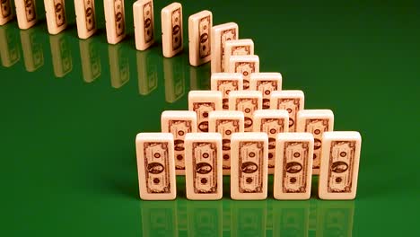 domino effect illustrating the chain reaction of economic collapse, high unemployment, business failures, and stocks crashing in a bear market economy