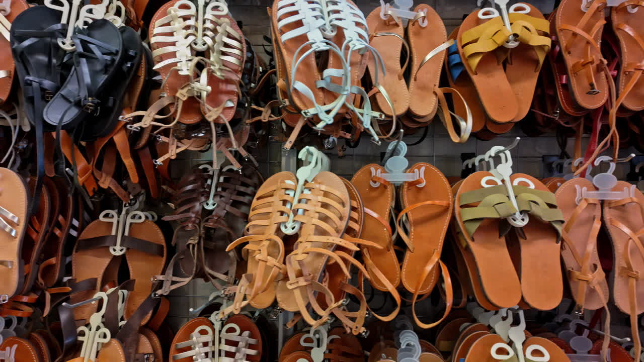Shoes and sandals for sell in the old market in Athens, Greece