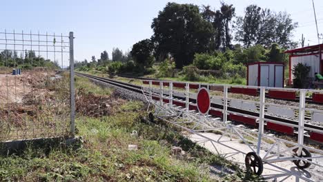 railroad barrier moves up and down repeatedly