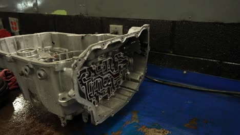 Torn down car transmission, push-in shot