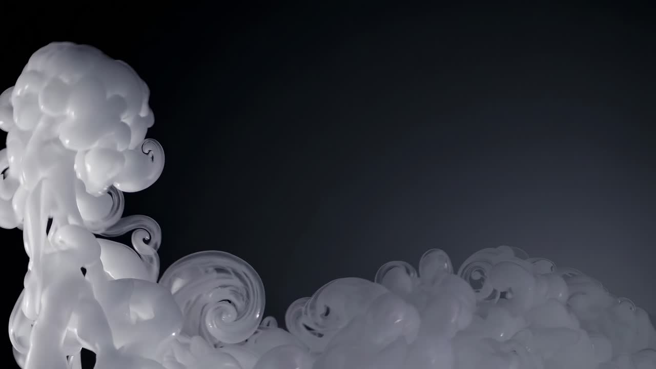 Abstract video of swirling white smoke against a dark background, captured from a side angle