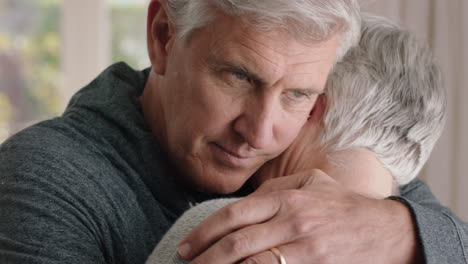 mature-man-hugging-sad-wife-sharing-bad-news-couple-embracing-stressful-retirement-marriage-problems-4k-footage