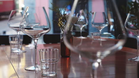 empty wine glasses on a wooden table