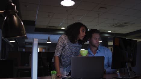 young office executives working over computer in a modern office