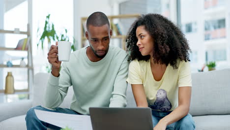 Black-couple,-laptop-and-mortgage-expenses