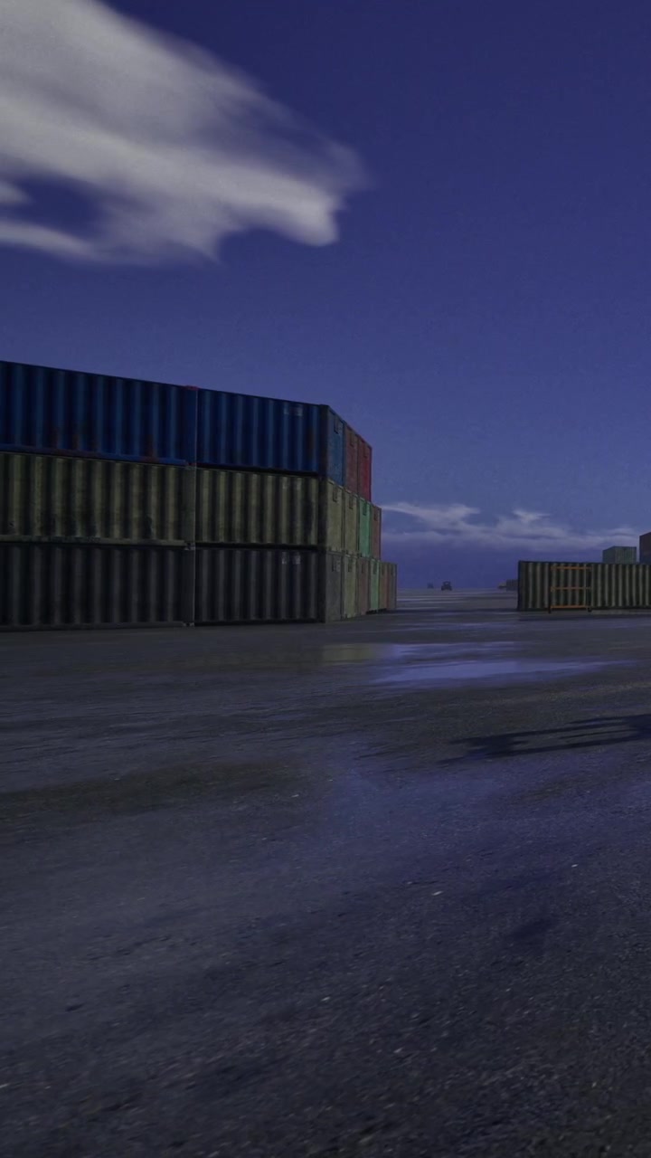 Containers stacked at a shipping yard during night time in a quiet location