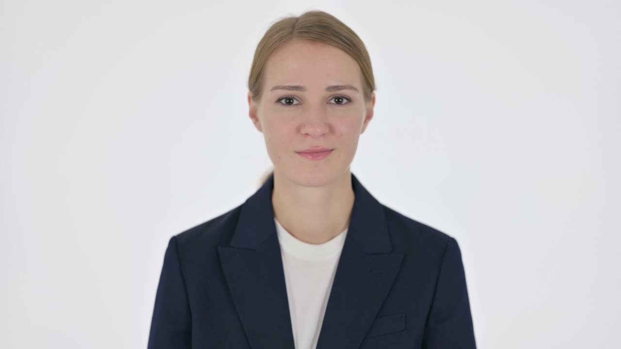 Businesswoman Showing Stop Sign on White Background