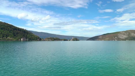 People-Visit-Lake-Annecy-for-marvellous-canals,-colourful-buildings,-water-sports-and-refreshing-swims-in-the-clean-water