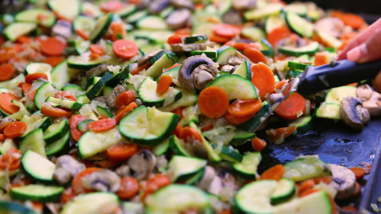 Grilled Vegetable Combination of Cucumbers, Carrot, and Mushrooms on Skillet
