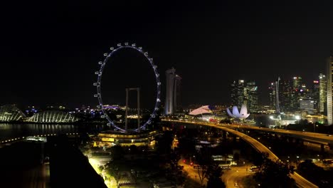 singapore at night: marina bay sands and singapore flyer