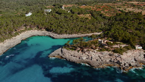 Scenic-View-Of-Rocky-Cliffs-On-The-Cove-Beach-Of-Caló-des-Borgit-In-Mallorca,-Spain