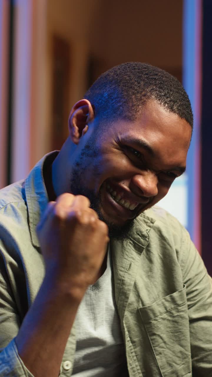 Vertical Video African american person being happy and proud with his project achievement