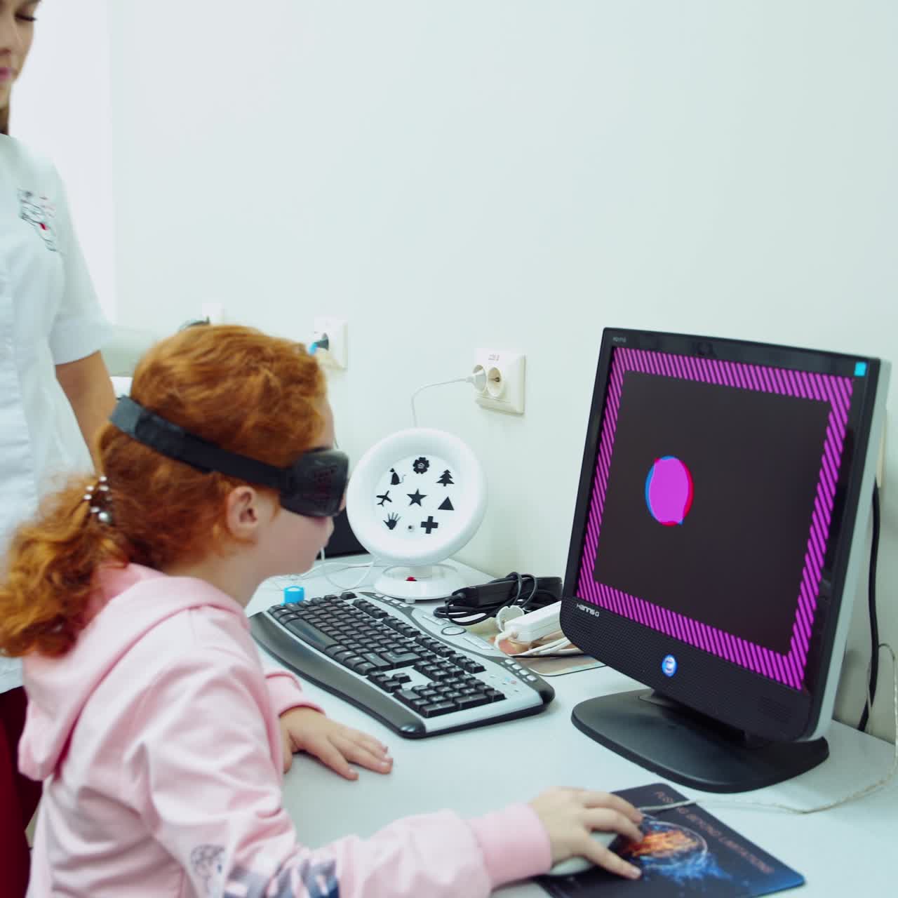 Doctor examing small girl patient