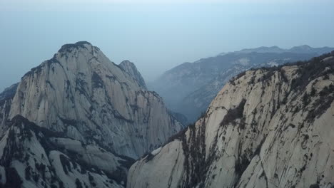 amazing steep granite cliffs in huashan mountain range, china aerial