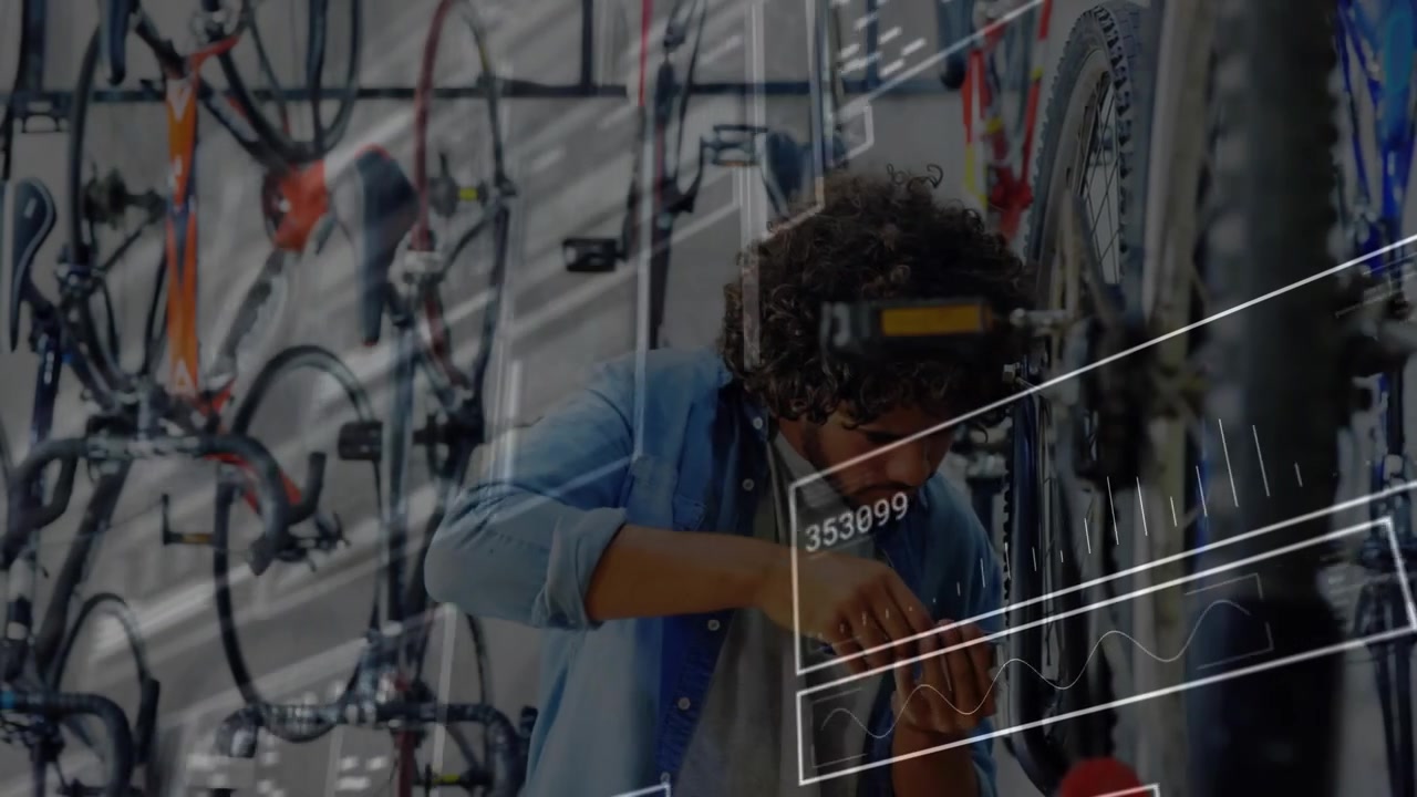 Bicycle mechanic gripping wrench and adjusting spokes while schematic overlays updating alignment
