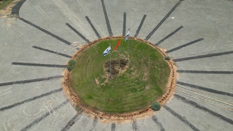 4K-high-resolution-aerial-drone-video-view-of-the-flower-highway-interchange-with-Israeli-flags--Rishon-Lezion--Israel