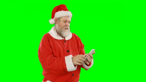 Weihnachtsmann-Benutzt-Mobiltelefon