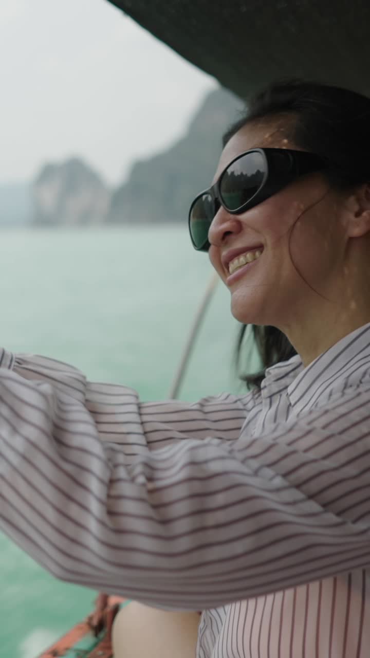 Woman enjoying a boat ride