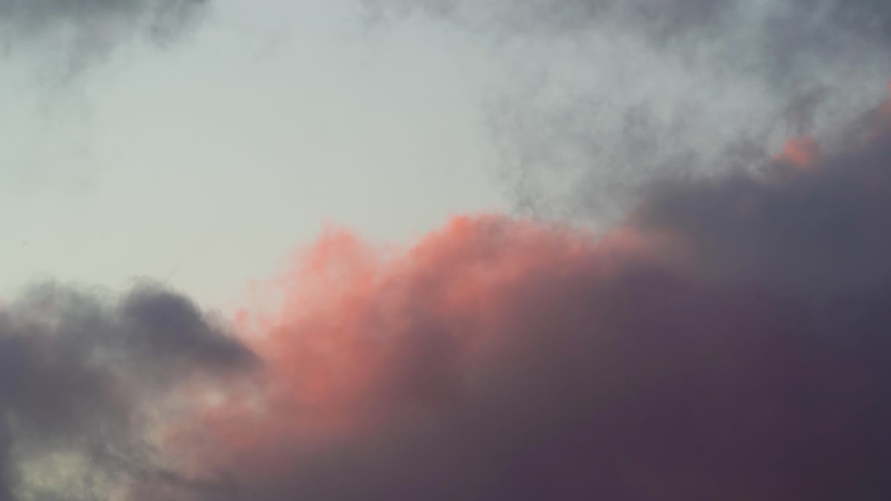 Clusters of Cumulus Clouds Floating Across the Skyline