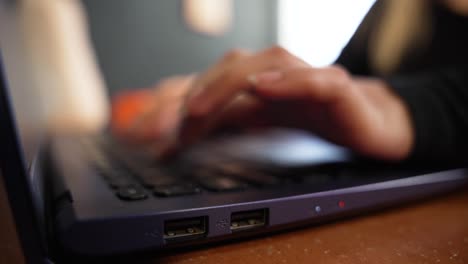 Close-up-of-female-hands-typing-on-keyboard