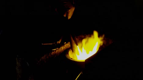 craftsman using using acetylene torch for melting hot metal 4k