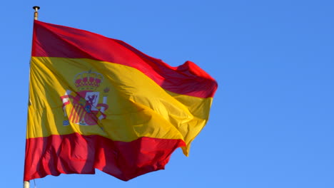 spanish flag slow motion waving in wind